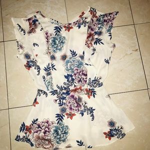 White floral sleeveless blouse